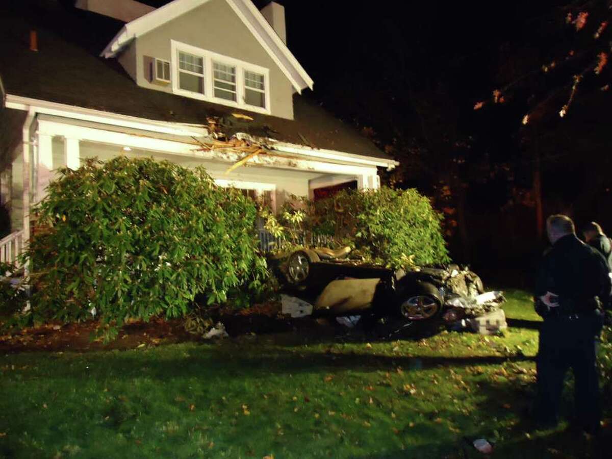 Russell Stidolph of Rowayton was charged with drunk driving Monday after launching his Porsche Carrera 35 feet in the air and crashing into the second floor of a house on Highland Avenue on Nov. 19 Stidolph was trapped for 40 minutes until firefighters rescued him.