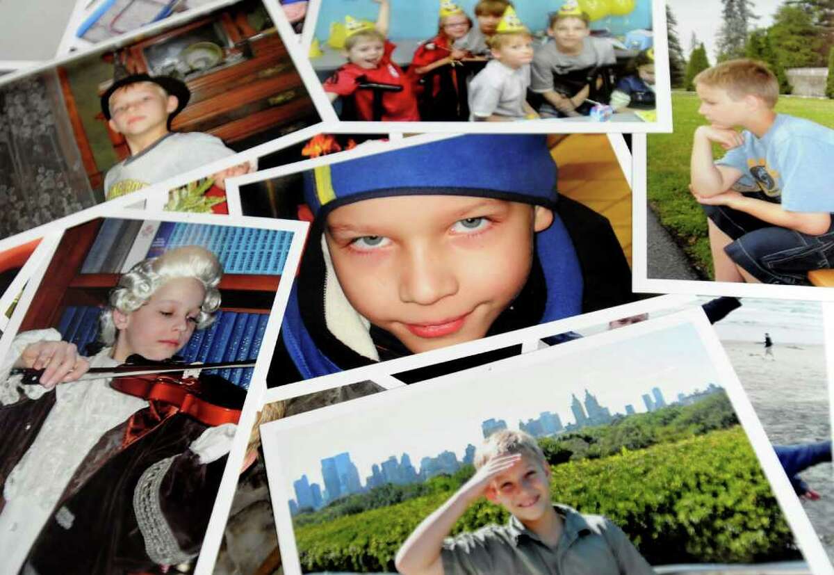 Family photographs of Nicholas Naumkin of Wilton, who was killed Dec. 22, 2010, after a friend shot him accidentally with a handgun. (Cindy Schultz / Times Union archive)