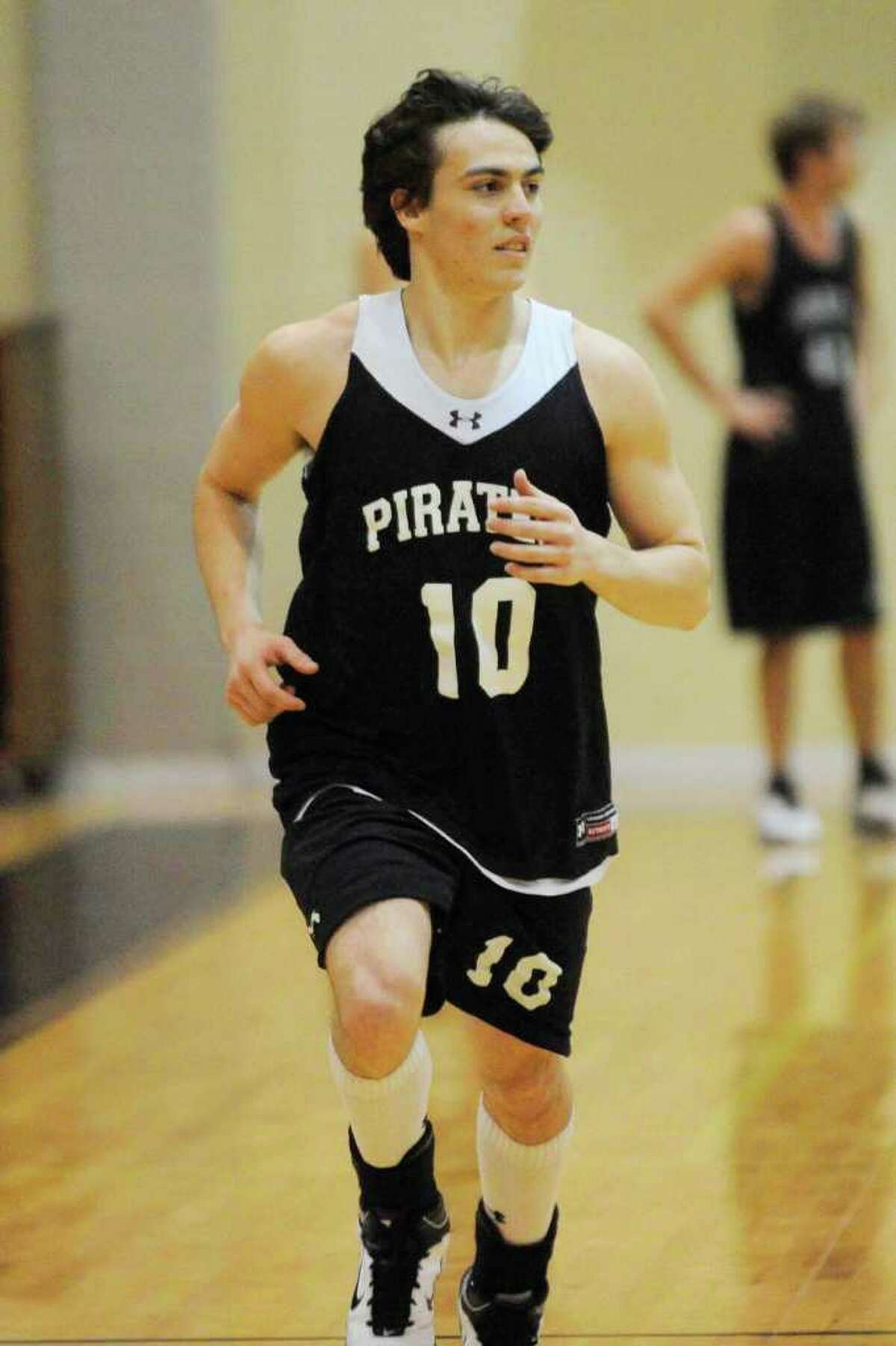 Vidor boys basketball player Elon Mancebo works on team drills with the Pirates during practice on Wednesday. Mancebo, a foreign exchange student from Brazil, leads the team in scoring. Vidor will host Ozen for a District 20-4A game on Friday. Wednesday, January 5, 2010 Valentino Mauricio/The Enterprise