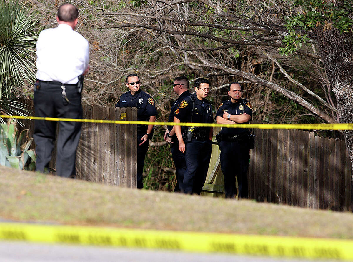 Members of the SAPD work the scene of a home invasion and shooting in the 7100 block of Oakridge Drive Ton Jan. 6, 2011. The homeowner shot and killed the intruder and a second suspect was arrested a few blocks away from the scene.