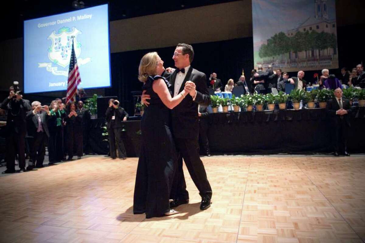 Governor Dannel P. Malloy and his wife Cathy share their first dance during the 2011 Inaugural Ball honoring Connecticut's 88th Governor to the tune of Frank Sinatra's "Fly Me to the Moon" at the Connecticut Convention Center in Hartford, Conn., Wednesday evening, January 5, 2011. The ball is hosted by the Board of Trustees of the First Company Governor's Foot Guard.