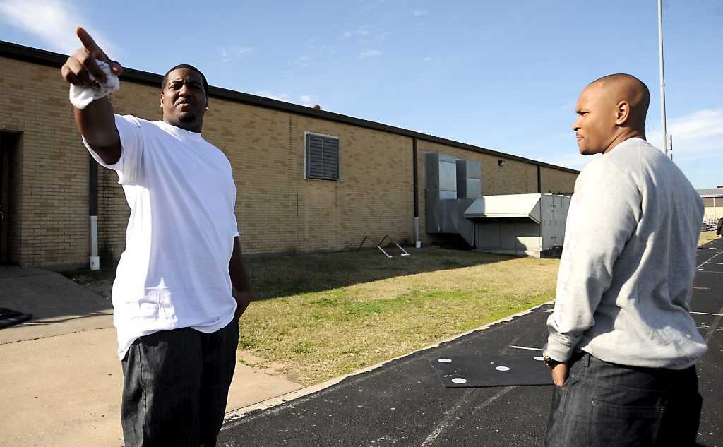 NFL player Anthony Collins returns to visit former high school