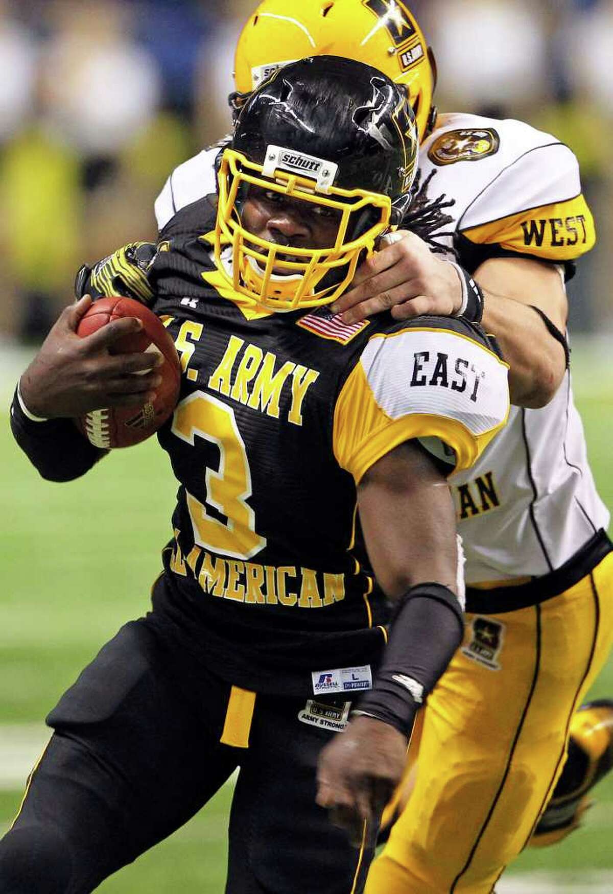 SPORTS MVP Demetrius Hart runs for a gain on the right to the sideline at the U.S. Army All-American Bowl at the Alamodome on January 8, 2011. Tom Reel/Staff