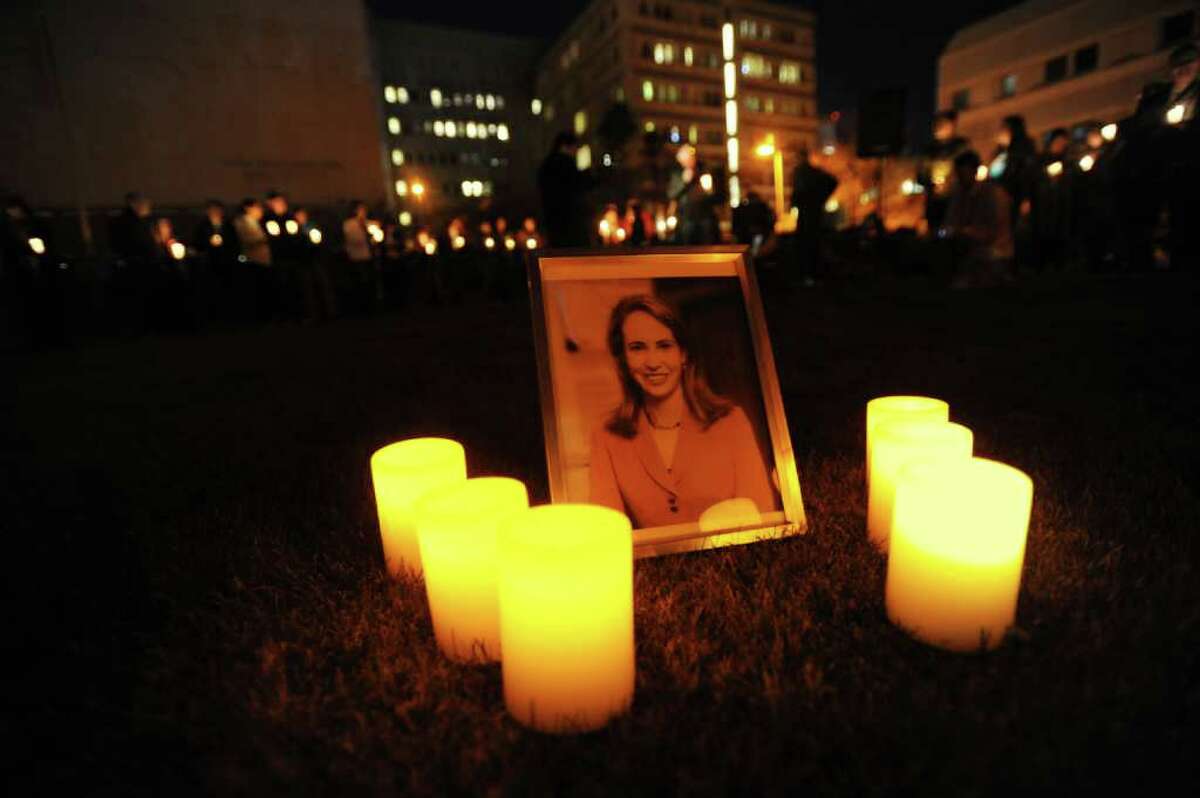 TUCSON, AZ - JANUARY 8: People gather for a vigil at University Medical Center for U.S. Rep. Gabrielle Giffords (D-AZ), who was shot during an event in front of a Safeway grocery store January 8, 2011 in Tuscon, Arizona. U.S. Rep. Gabrielle Giffords (D-AZ) was shot in the head at a public event entitled "Congress on your Corner" when a gunman opened fire outside a Safeway grocery store in Tucson, Arizona. It was reported that eighteen people were shot, including members of Giffords' staff, and six are dead, including one young child. One suspect is in custody. (Photo by Laura Segall/Getty Images)