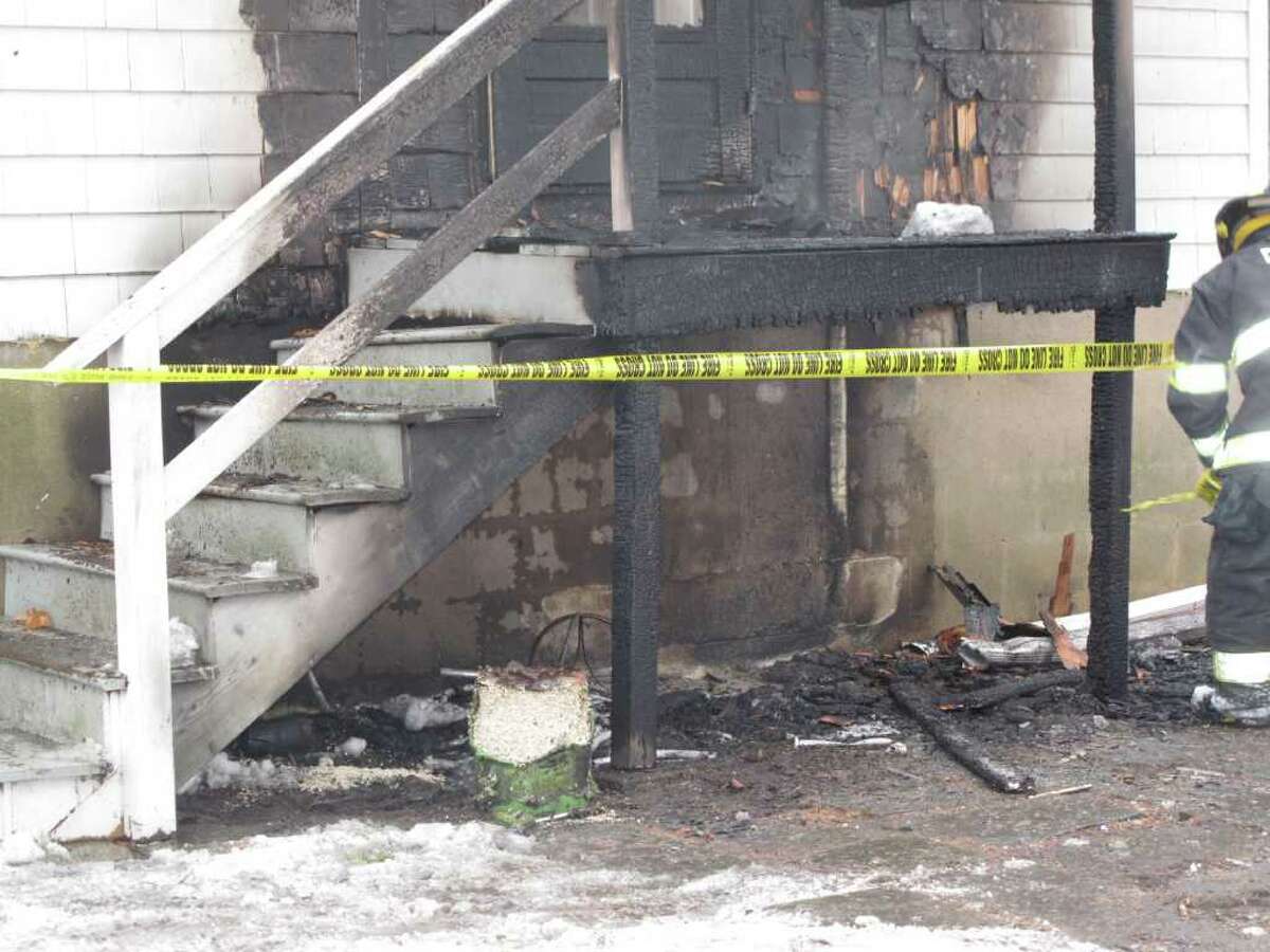 Darien home damaged after cigarette ignite propane tanks