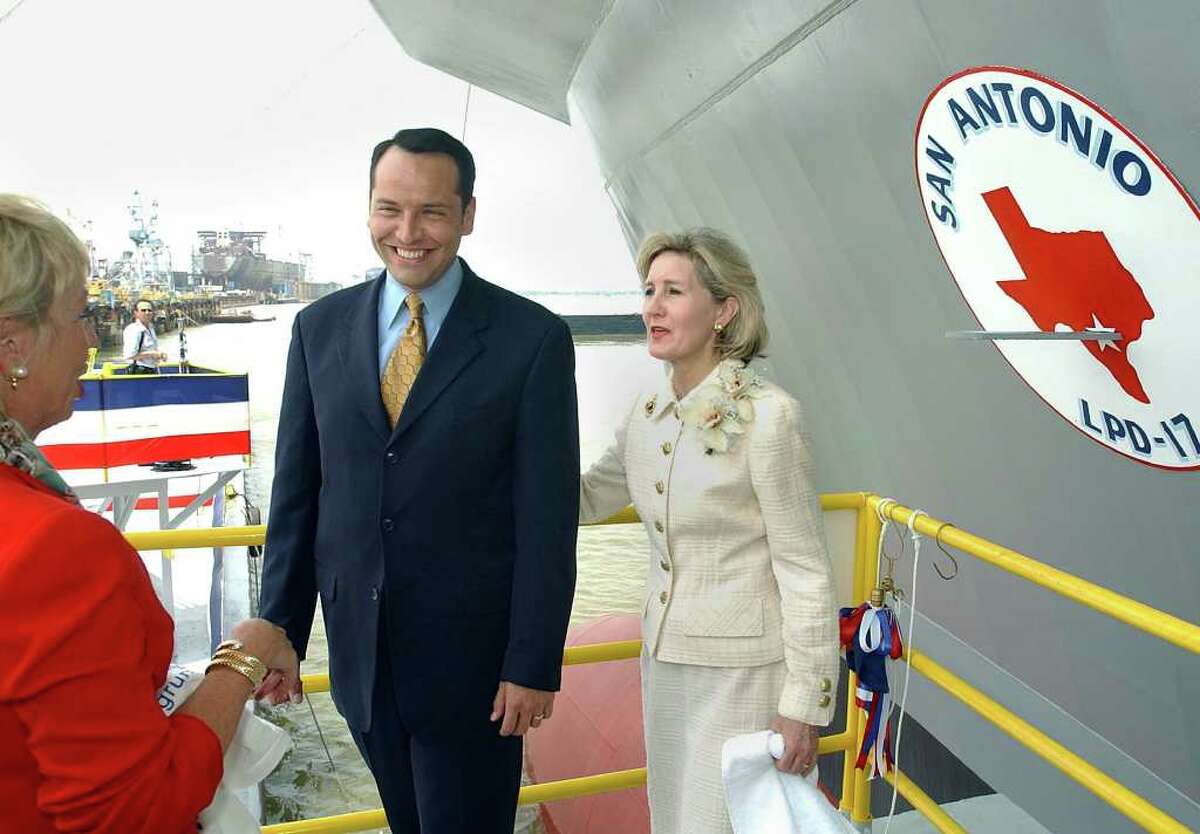 METRO SAN ANTONIO MAYOR ED GARZA, is greeted by Trisha Wilson, one fo the Matrons of Honor at the christening of the LPD-17 ship to be commissioned as the USS San Antonio. He was standing on the christening platform with Texas Senator Kay Bailey Hutchison . The ceremony took place Saturday, July 19, 2003 at the Northrop Grumman Ship System Avondale plant near New Orleans.