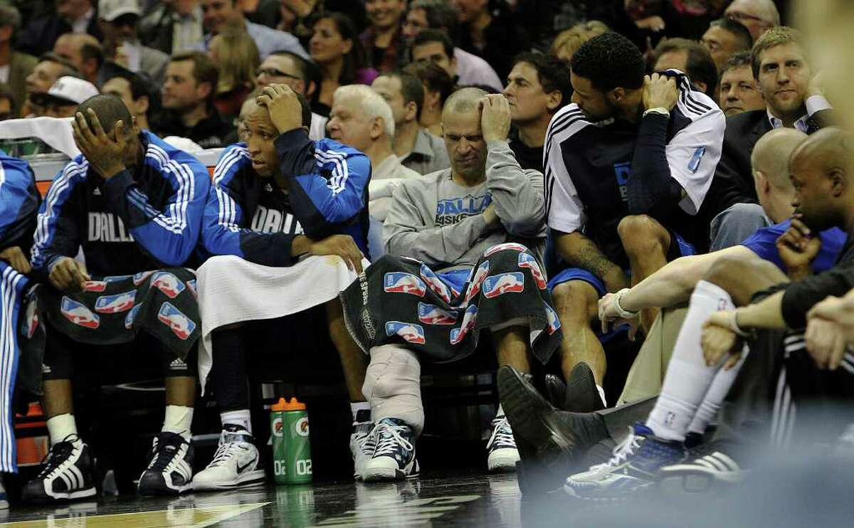 The Dallas Mavericks bench appears solemn in the second half of the game against the Spurs in the second half at the AT&T Center on Friday, Jan. 14, 2011. Spurs defeated the Mavericks, 101-89. Kin Man Hui/kmhui@express-news.net