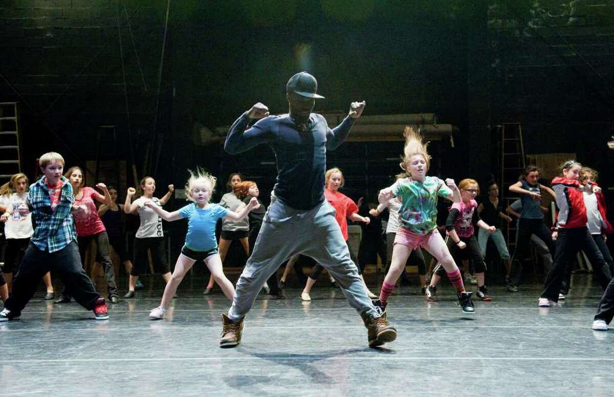 Jermaine Browne leads a DanceFest 2011 master class in hip hop at the Palace Theater in Stamford, Conn., Sunday, January 16, 2011. The Connecticut Commission on Culture and Tourism sponsors the event which allows dance students to hone key dance techniques taught by master dance teachers like Browne.
