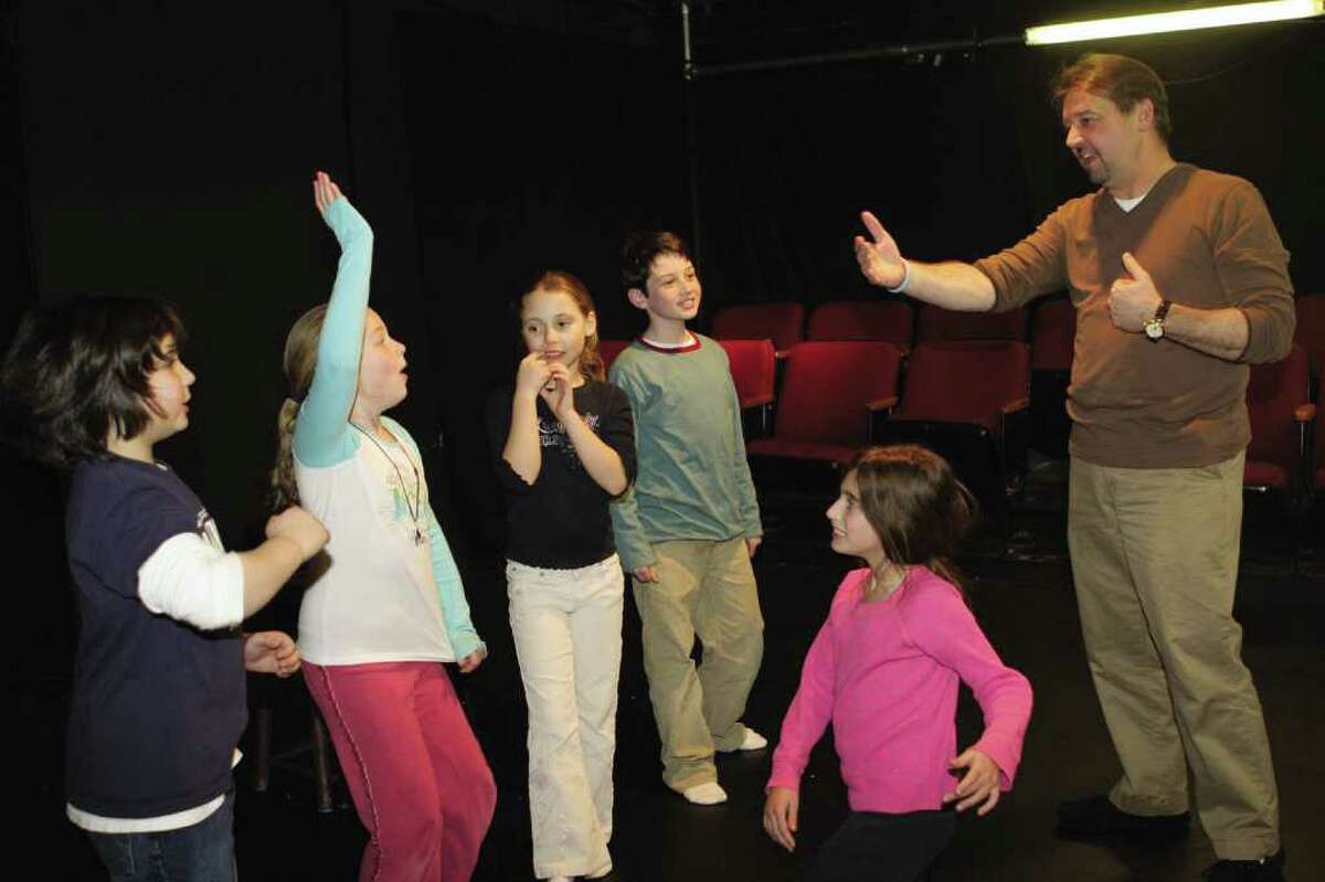 Jim Schilling, co-founder of the Music Theatre of Connecticut in Westport, teaches a class of students recently. The MTC is one of about a dozen theater schools in the region catering to students of various ages.