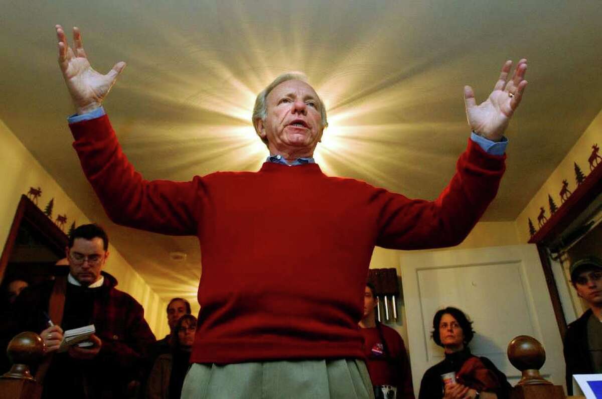 Senator Joe Lieberman greets local activitists at a house party at the home of Kerry Stap in Windham, NH. on Jan. 7, 2004.