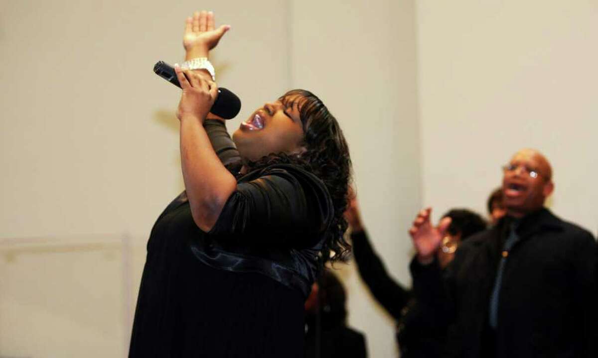 Noelle Pinyard, of the East End Baptist Tabernacle Church Mass Choir, sings during the 32nd Annual Dr. Martin Luther King, Jr. celebration at Mount Avery Baptist Church in Bridgeport on Monday, Jan. 17, 2011.
