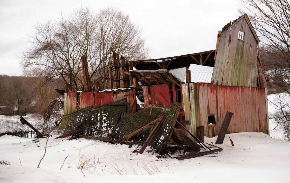 Historic Newtown barns collapse under weight of snow