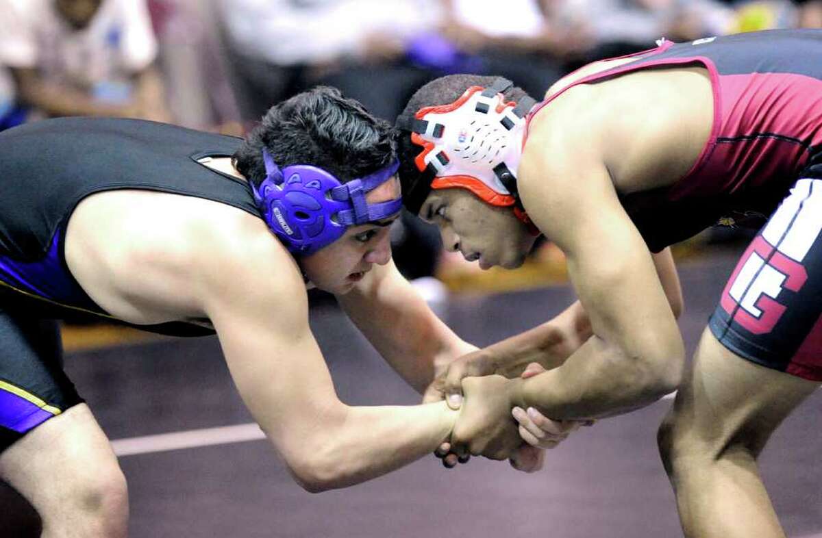 160 pound weight class, Carlos Alvarado of Westhill High School, left, takes on Ryan Whittle of Greenwich High School, right, during wrestling match between Greenwich High School and Westhill High School, at Greenwich High School, Wednesday afternoon, Jan. 19, 2011.