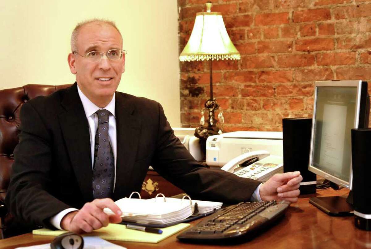 Attorney Gregory Klein in the offices of Alan Barry & Associates where he works, in Danbury, Wednesday, Jan. 19, 2011.