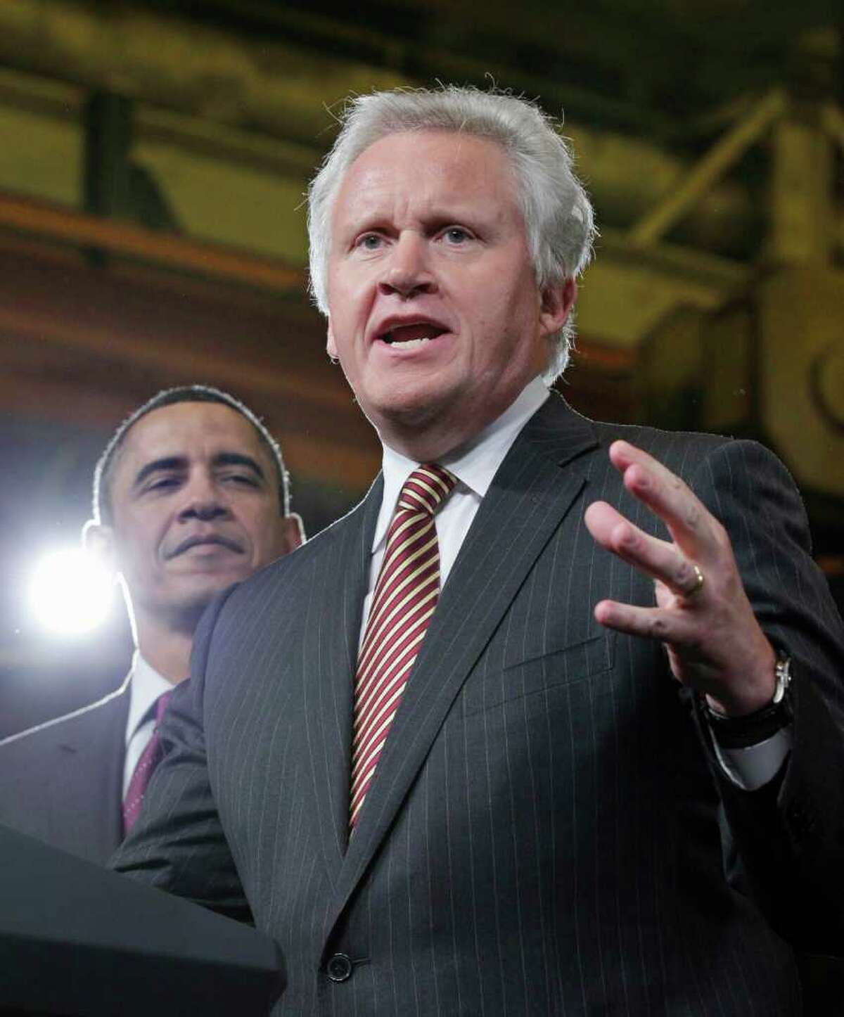 President Barack Obama is introduced by GE CEO Jeffrey Immelt as he visits the birthplace of the General Electric Co., Friday, Jan. 21, 2011, in Schenectady, N.Y. (AP Photo/J. Scott Applewhite)