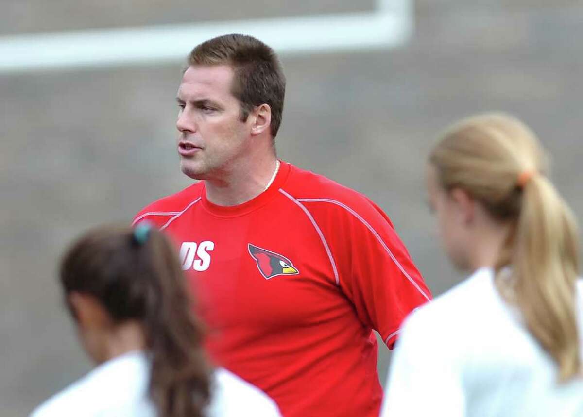 Greenwich High School girls soccer coach Danny Simpson speaks to his team during practice at the school Thursday, Sept. 9, 2010.