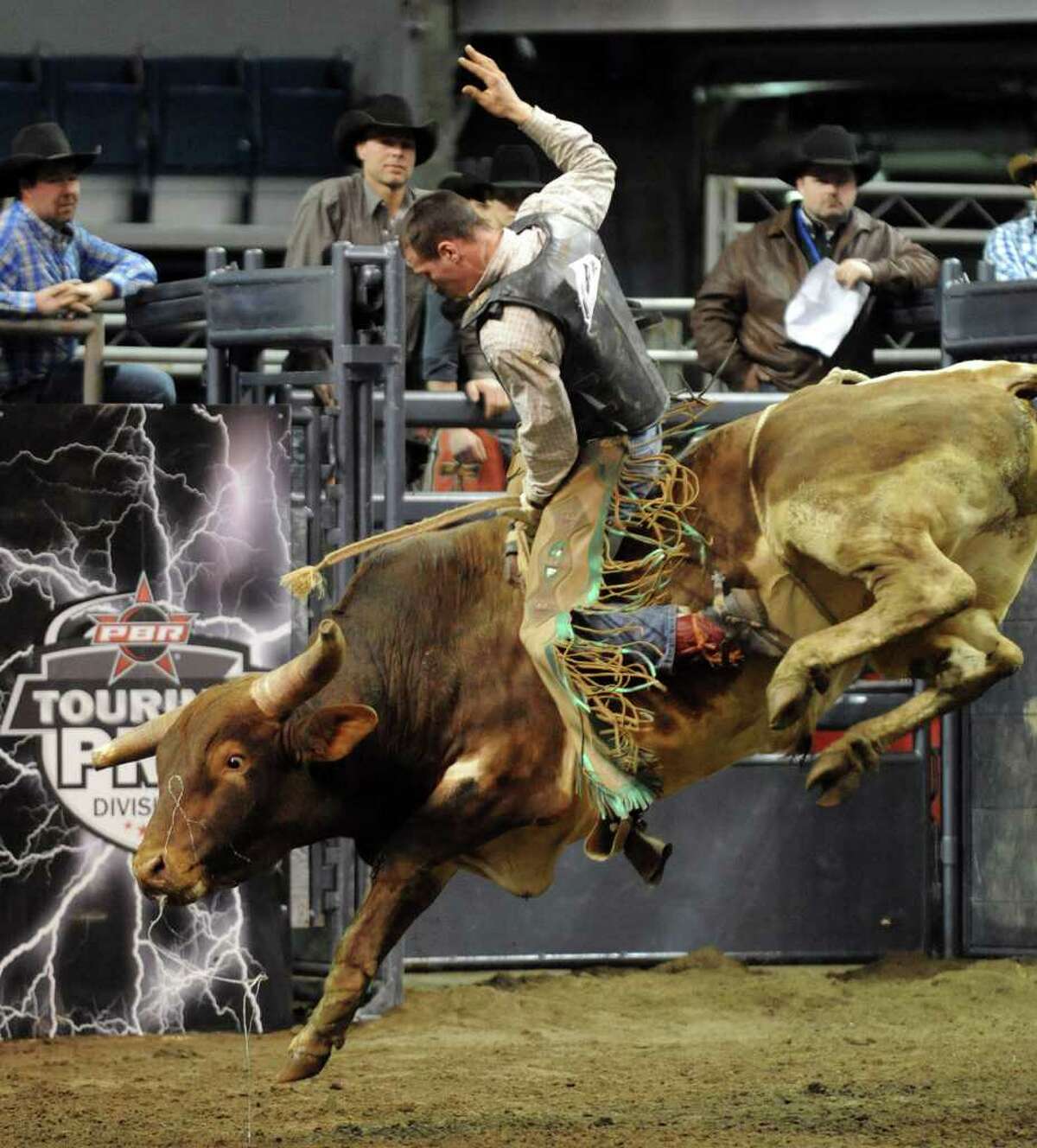 The Professional Bull Riders Touring Pro Division came to Webster Bank Arena at Harbor Yard in Bridgeport, Conn. for the Town Fair Tire Invitational on Friday January 21, 2011. Andrew Forcier, from Orange, rides True Gritt during the invitational.
