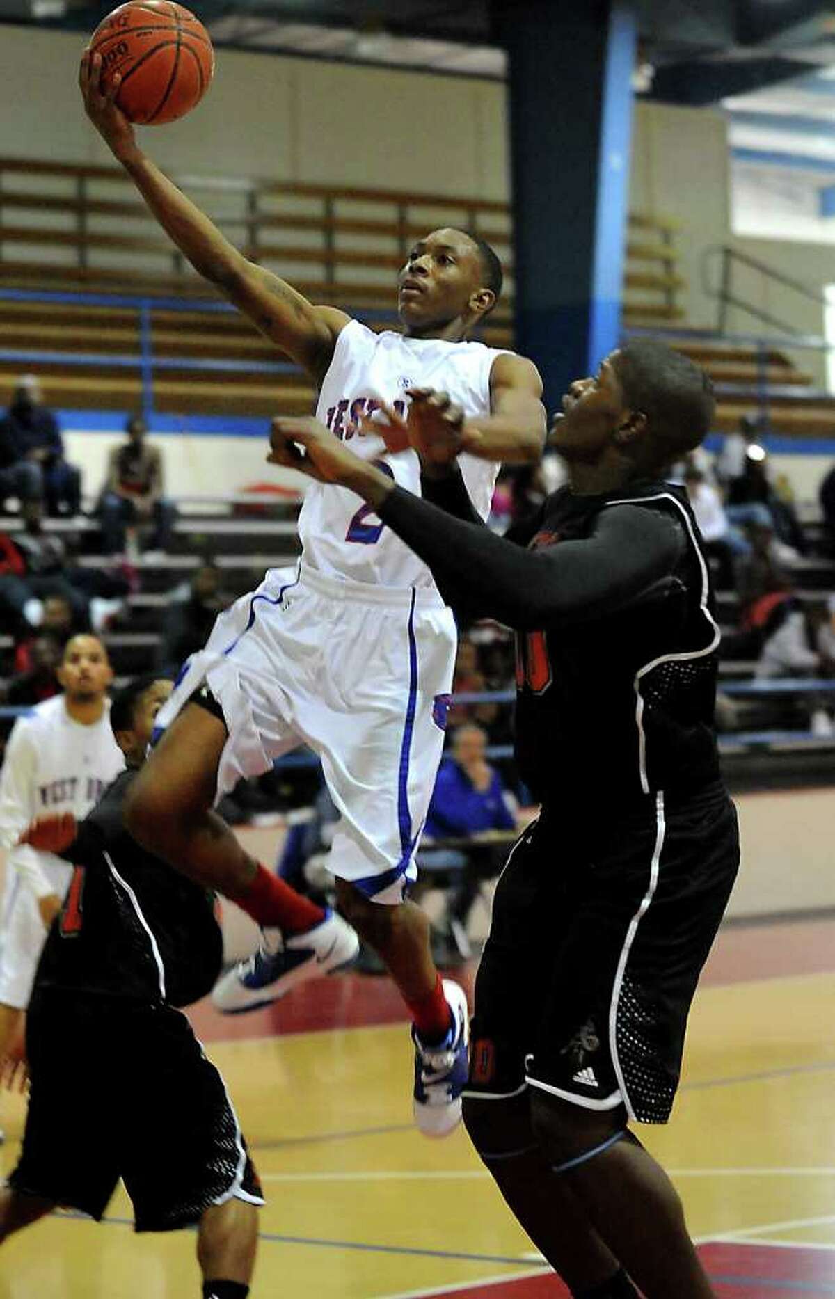 West Brook gets key late rebounds in boys basketball win over Port