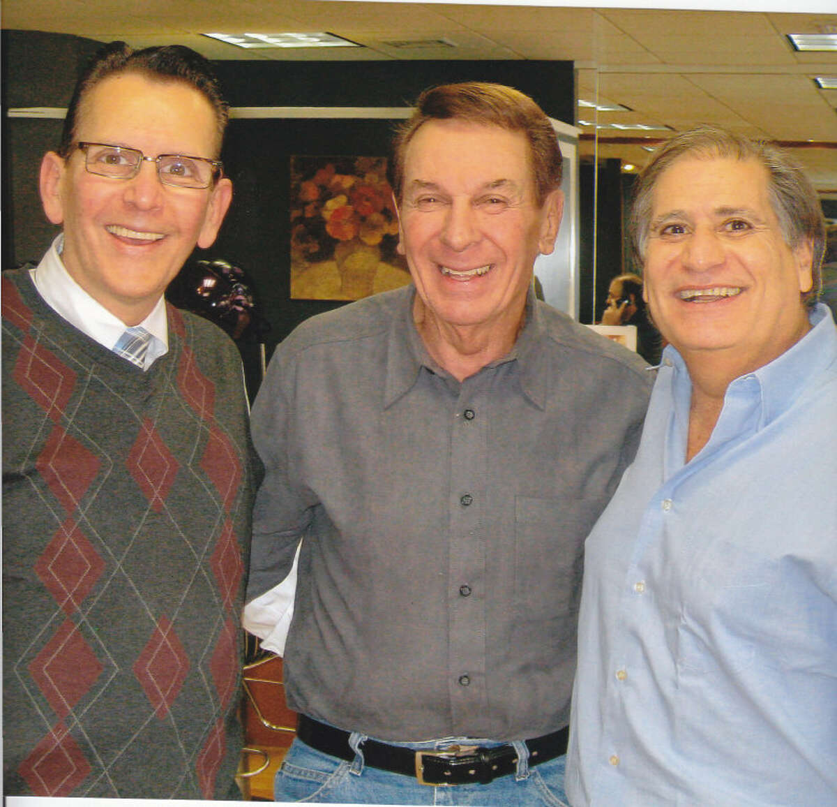 From left: Barry Silverman, singer Freddy "Boom Boom" Cannon and Guy Sasson. Cannon, a popular rocker from the 50s and 60s, made a surprise visit Jan. 15 to the Guy Sasson Hair Salon on High Ridge Road in Stamford.