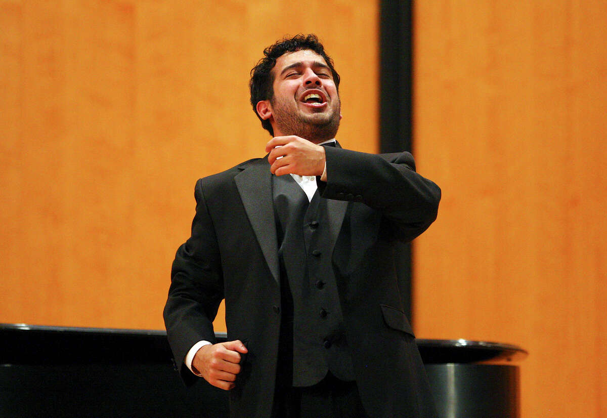 Tenor Juan José de León, 26, of Corpus Christi performs Sunday during the 52nd annual Metropolitan Opera National Council’s Southwest Regional Finals. He won first place and will advance to the national semifinals in New York City in March.