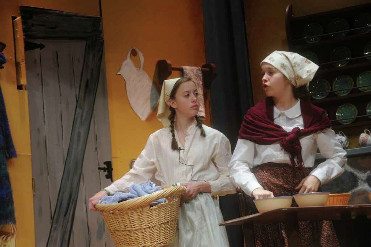 Elizabeth Ast playing Tzietel, left, and Grace Barber as Tevye's wife Golde, in a rehearsal of the Eastern Middle School eight-grade show chorus' production of "Fiddler on the Roof," on Monday, Jan. 24, 2011. The Eastern Middle School eighth-grade show chorus will perform the musical “Fiddler on the Roof” from Jan. 27-29 in the school’s Lee Book Auditorium, 51 Hendrie Ave. Show times are 4 p.m. Jan. 27, 7:30 p.m. Jan. 28 and 7:30 p.m. Jan. 29. Tickets for the Jan. 27 show are $5, and the following two shows are $10. Tickets are on sale in the main lobby of the school every day before school from 7:15 to 7:45 a.m. and after school from 2:45 4 p.m. Ticket reservations can also be made over the phone by calling the school office at 203-637-1744.