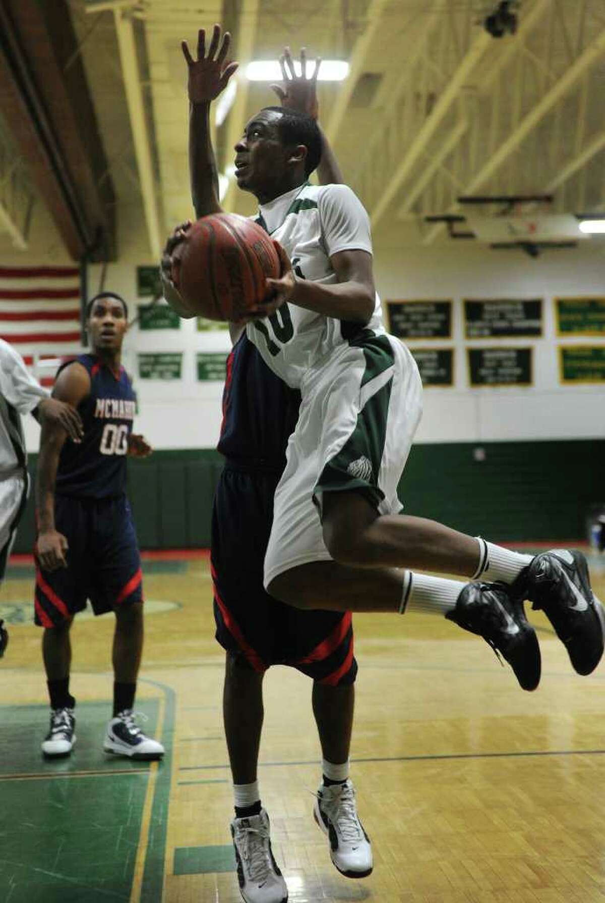 Bassick's Devin Coleman drives to the basket during their FCIAC matchup with Brien McMahon at Bassick High School in Bridgeport on Monday, January 24, 2011.