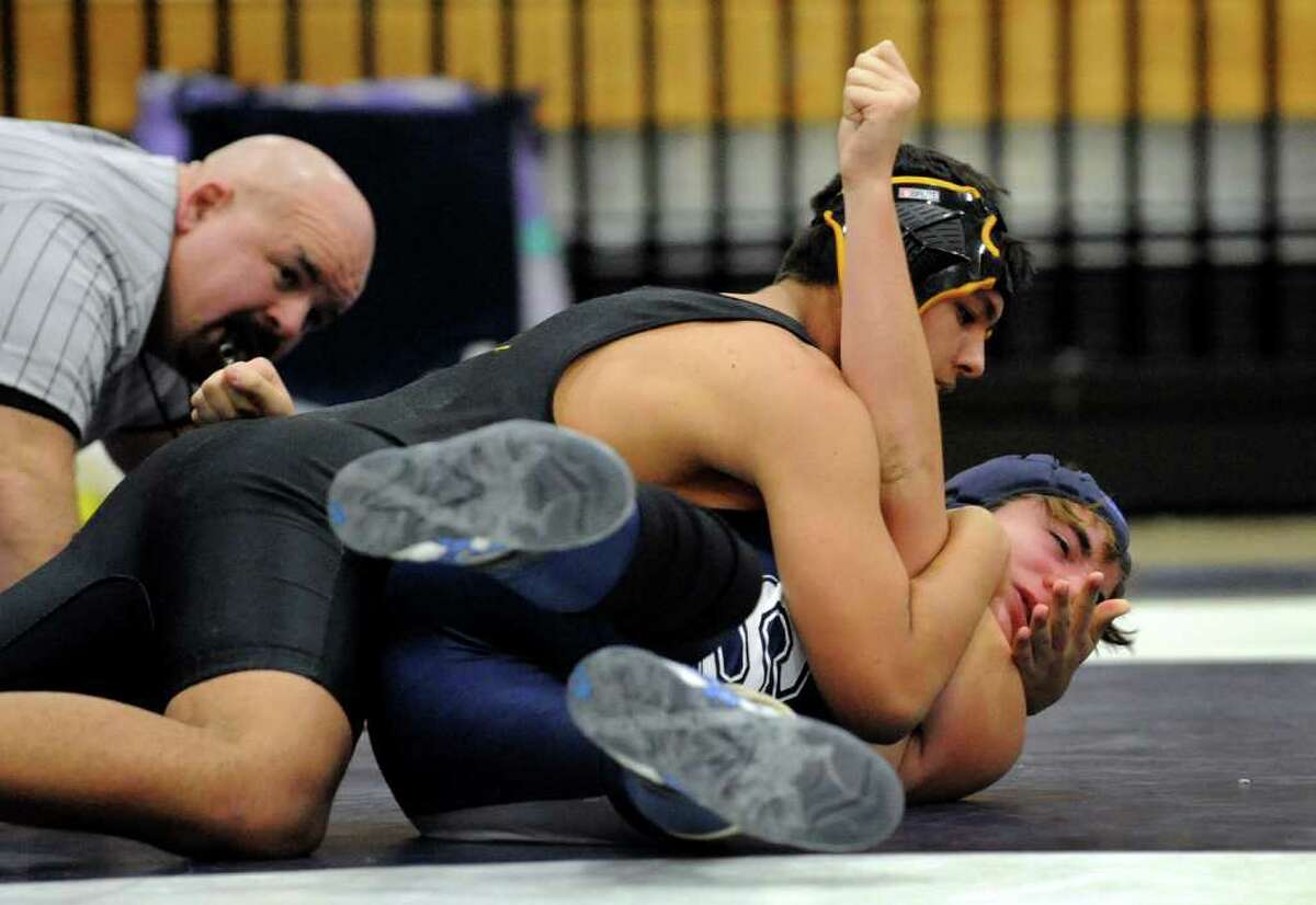 Winning streak ends for shorthanded Staples wrestlers