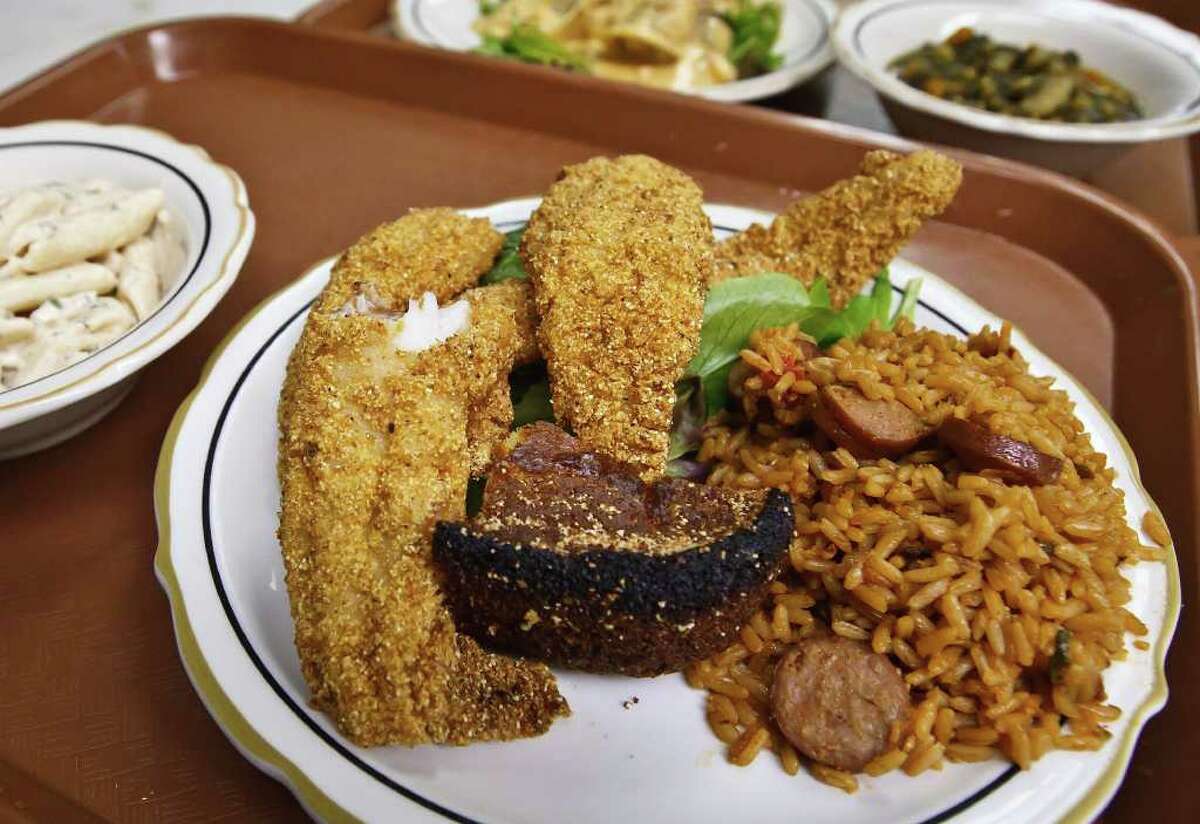 The Catfish Orleans plate, complete with jumbalaya rice, is served at Bernard's Creole Kitchen, located on the campus of Baptist University of the Américas.