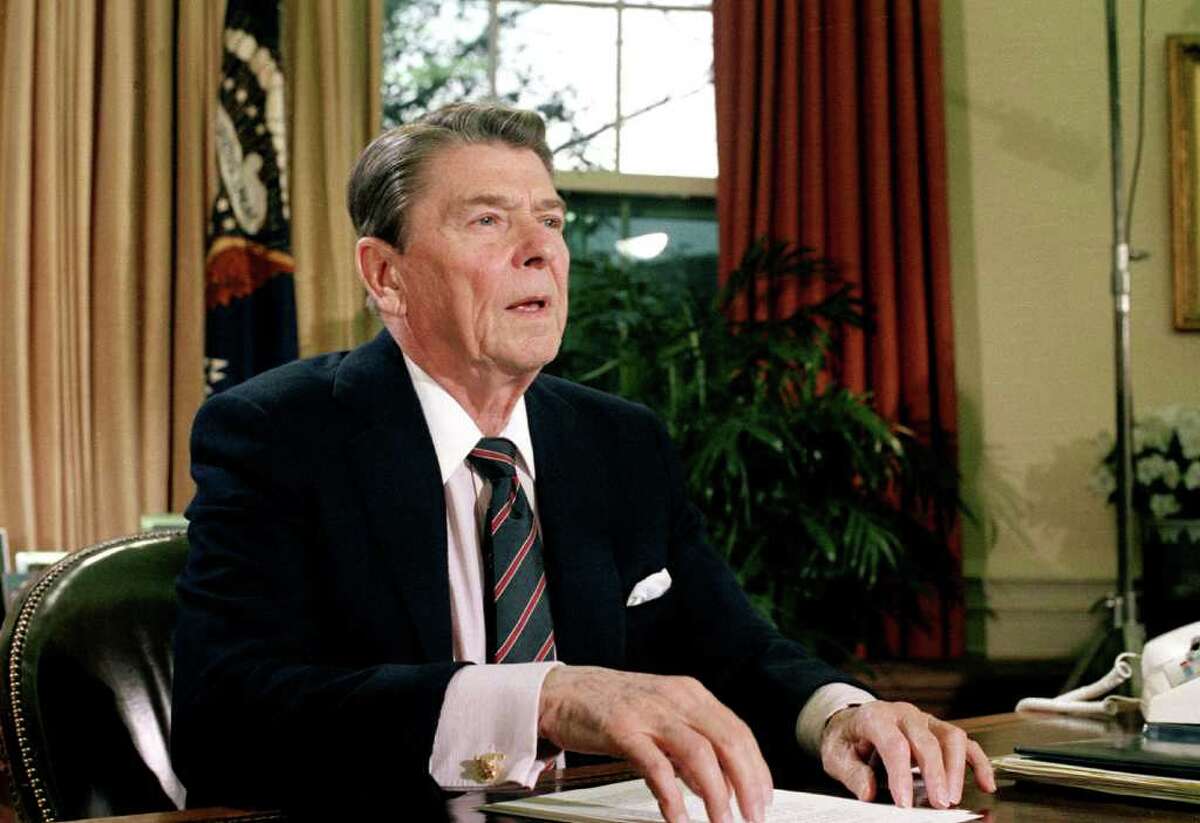 ** ADVANCE FOR USE FRIDAY, JAN. 28, 2011 AND THEREAFTER ** FILE - This Jan. 28, 1986 file picture shows U.S. President Ronald Reagan in the Oval Office of the White House after a televised address to the nation about the space shuttle Challenger explosion. (AP Photo/Dennis Cook)