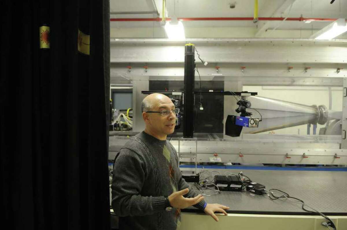 Professor Miki Amitay stands outside the low-speed wind tunnel at the RPI Aerospace Engineering lab in Watervliet, NY on Thursday, Jan. 27, 2011. Professor Miki Amitay and his team of students are studying ways to improve wind turbine blades and to improve the systems that maneuvers airplanes.