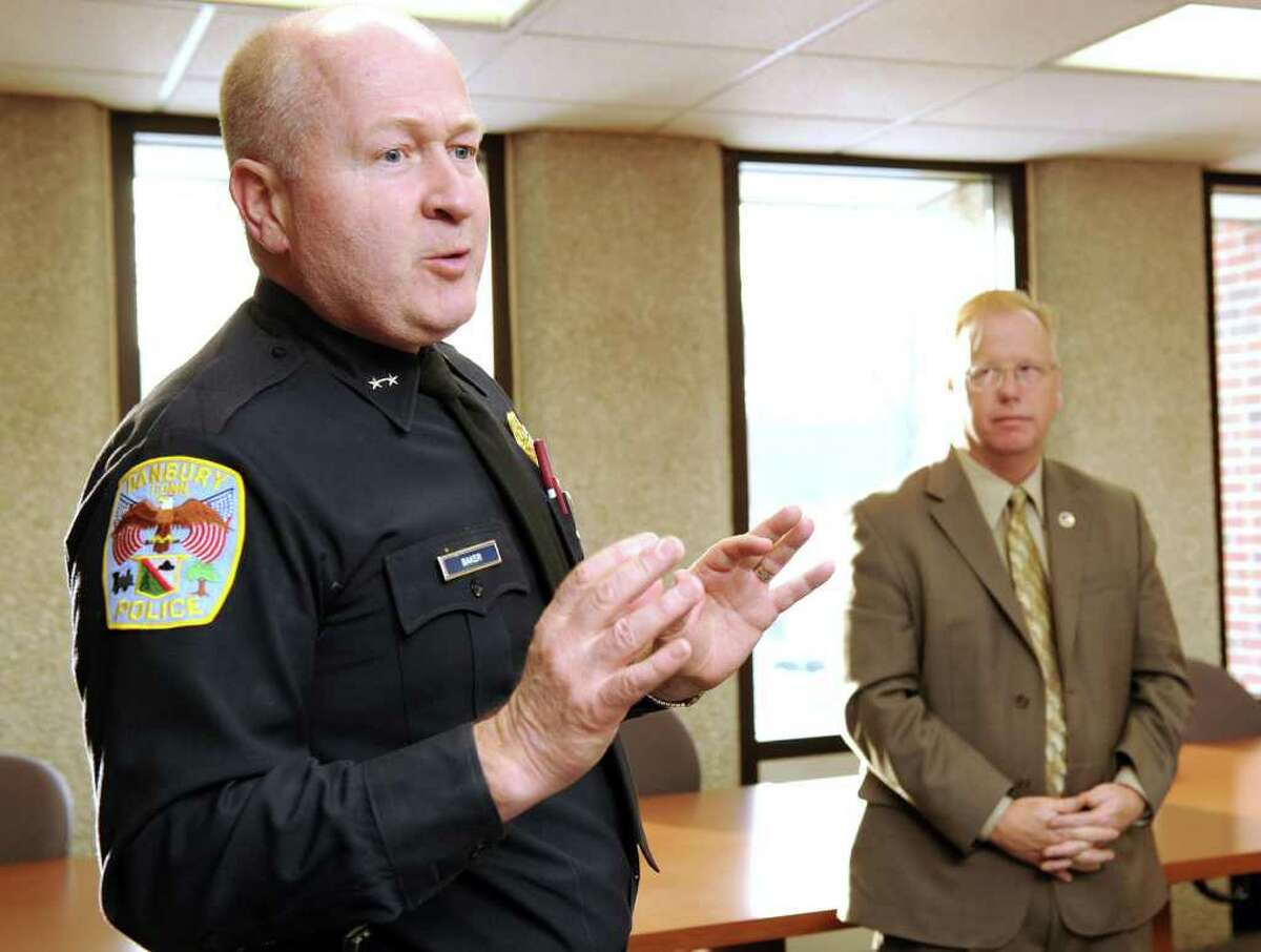 Danbury Police Chief Al Baker, left, addresses a press conference Monday called by Mayor Mark Boughton, right to plan for the coming snow and ice storms. Photo taken Monday, January 31, 2011.