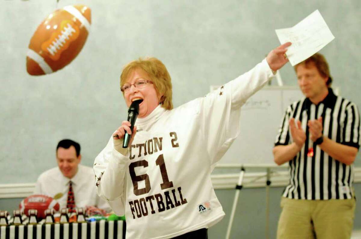 Resident Center Care Coordinator Colleen Foro, center, emcees Wheelchair Super Bowl VIII as Sackers take on the Wheelers on Tuesday, Feb. 1, 2011, at the Teresian House in Albany, N.Y. (Cindy Schultz / Times Union)