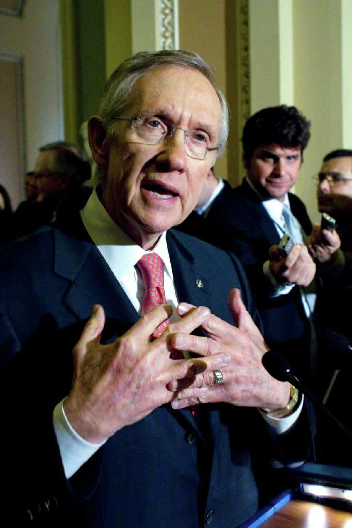 Senate Majority Leader Harry Reid, D-Nev., speaks to reporters after the weekly caucus luncheons on Capitol Hill in Washington, Jan. 25, 2011. (AP Photo/Harry Hamburg)