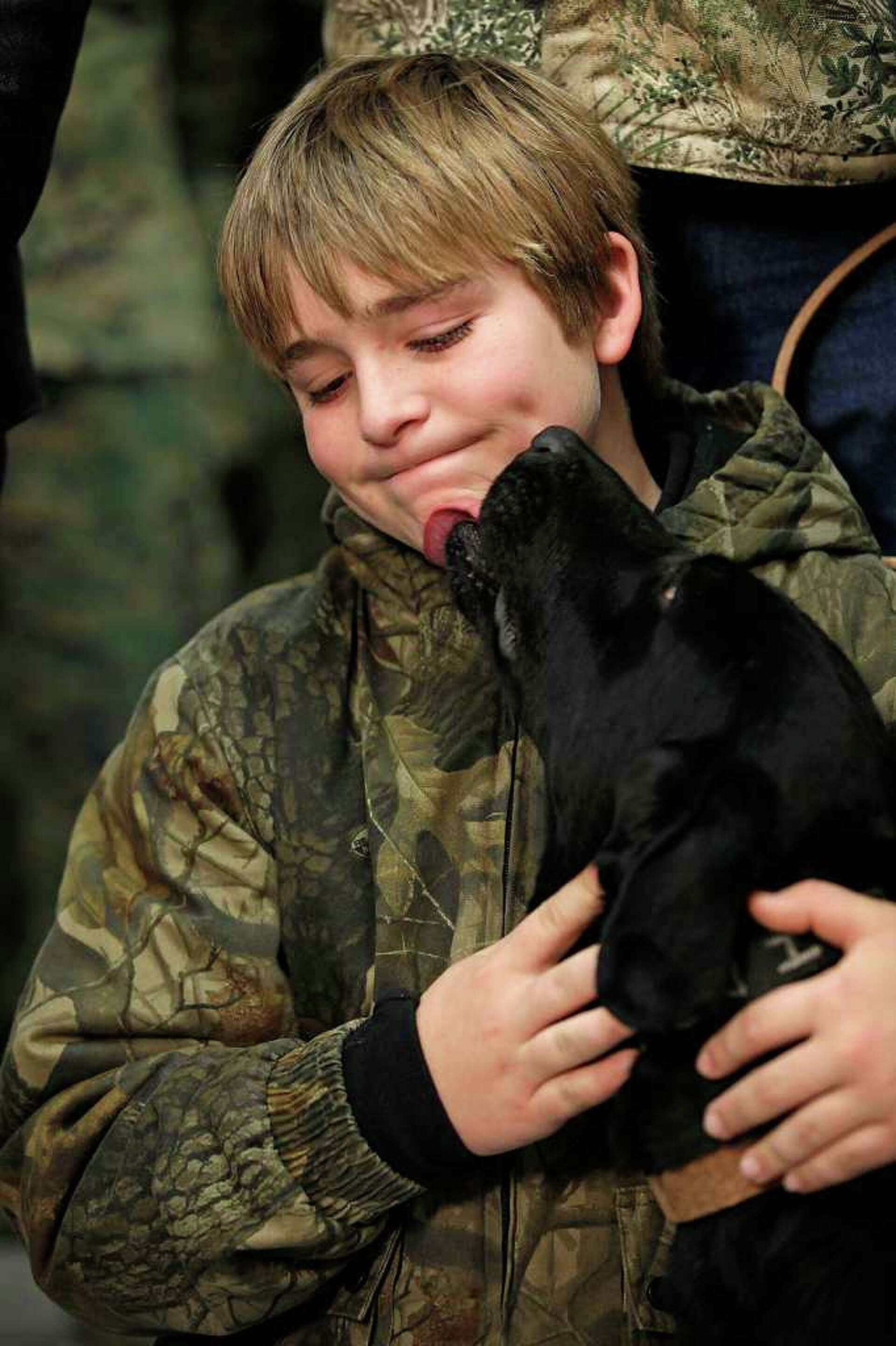 Fallen Marine's dog now is with his family