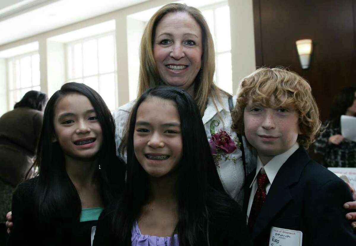 2011 BRAVA Award winner Donna Adelberg-Spellman with her children, from left, Jennie, Caitlin and Ross before the start of the awards ceremony held at the Hyatt Regency Greenwich Friday afternoon.