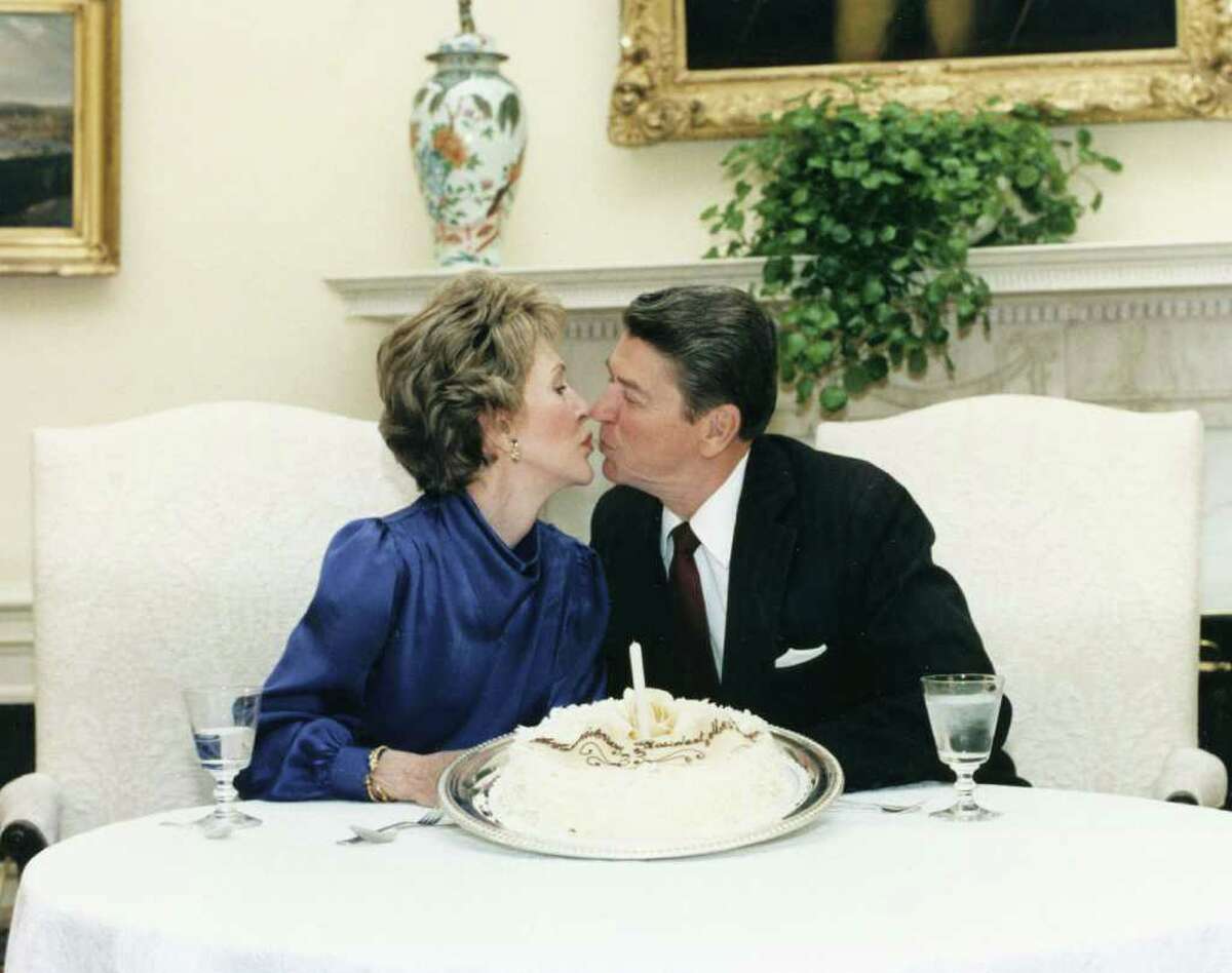 402010 07: Former U.S. President Ronald Reagan kisses former First Lady Nancy Reagan in this undated file photo. The couple celebrated their 50th wedding anniversary on March 4th 2002. (Photo courtesy Ronald Reagan Presidental Library/Getty Images)