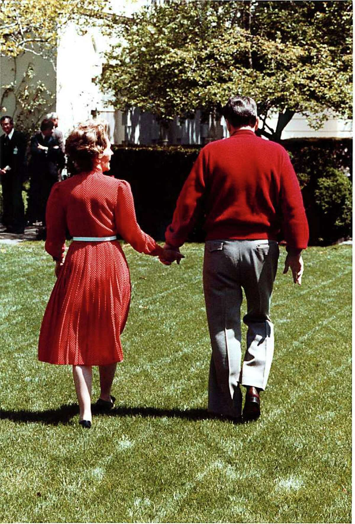 U.S. President Ronald Reagan And Mrs. Nancy Reagan Stroll Through The White House Rose Garden On April 16, 1981. 