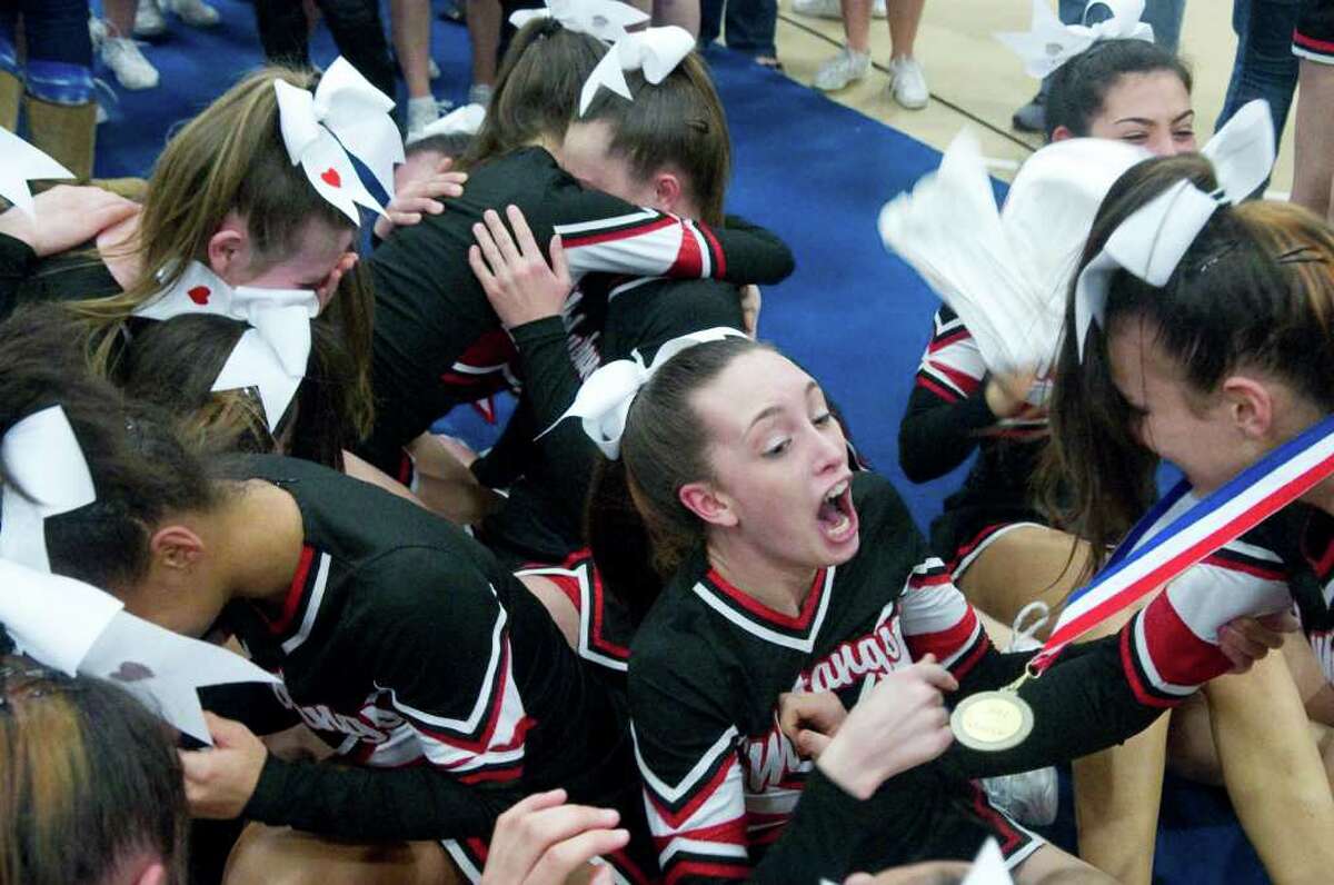 Fairfield Warde High School cheerleaders react to the announcement that they won the FCIAC Cheerleading Championships in Wilton, Conn., Sunday February 6, 2011.