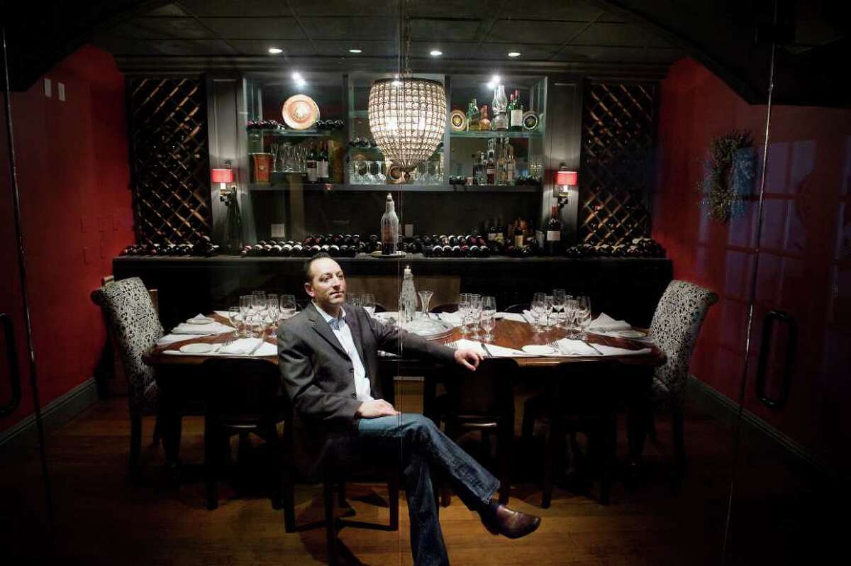 Enzo Bruno in the wine room of his Madonia Restaurant and Bar on Long Ridge Road in Stamford, Conn., Jan. 20, 2011. The wine room is private, separated from the rest of the restaurant by glass. It seats up to 10 people and though reservations are not necessary, they are advised.
