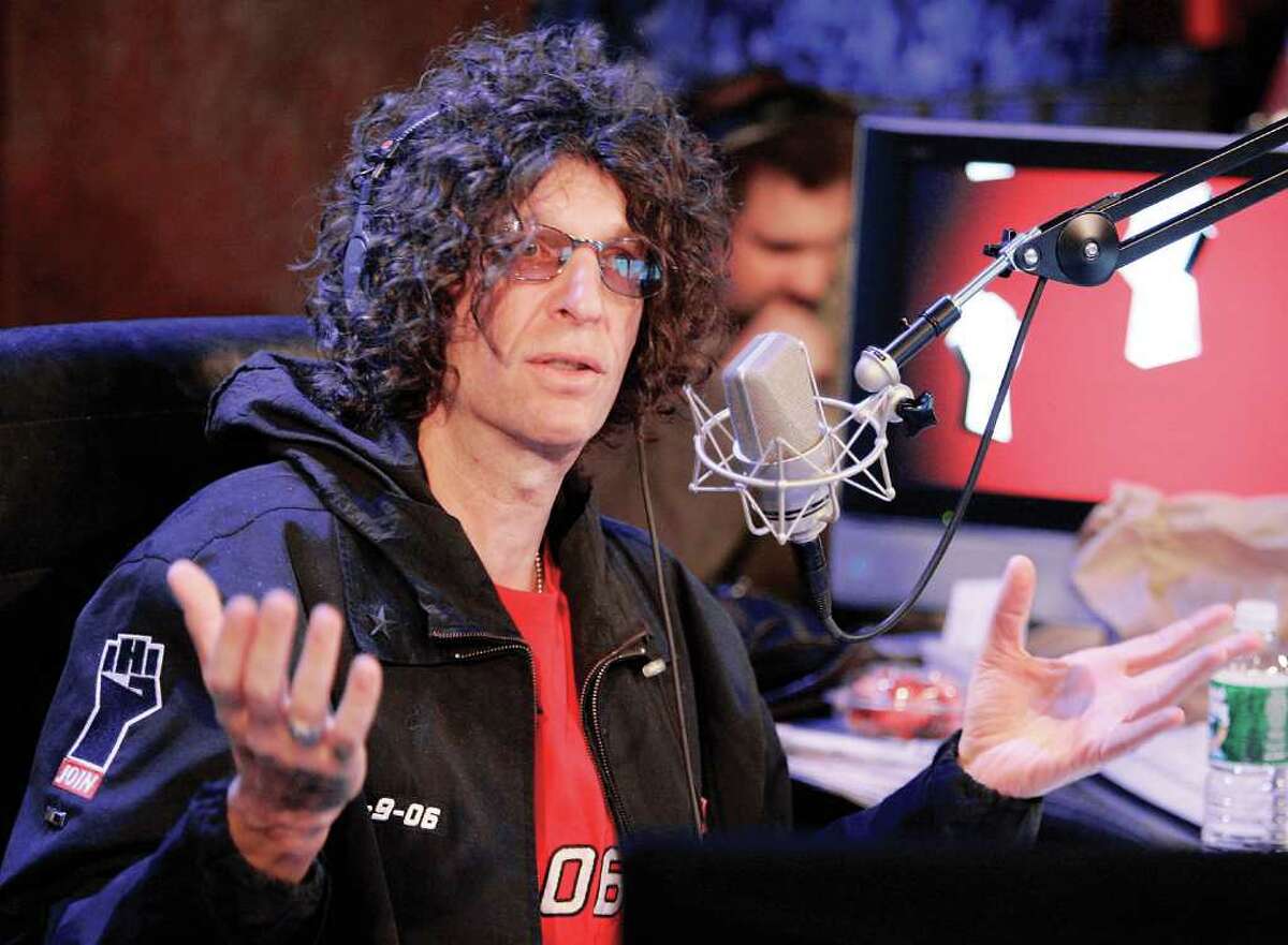 Radio personality Howard Stern responds to a question at an on-air news conference during his debut show on Sirius Satellite Radio, in New York, Jan. 9, 2006. (AP Photo/Richard Drew)