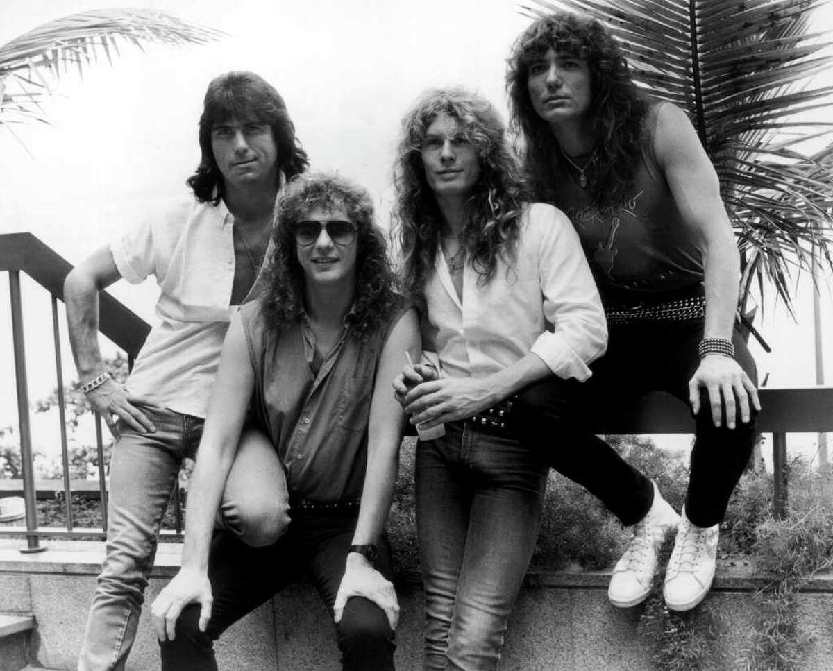 In the former catgeory were heavy metal band Whitesnake, seen here without the fancy car and the flexible woman, in Rio de Janeiro, 24th January 1985. From left, Cozy Powell (1947 - 1998), Neil Murray, John Sykes and David Coverdale.