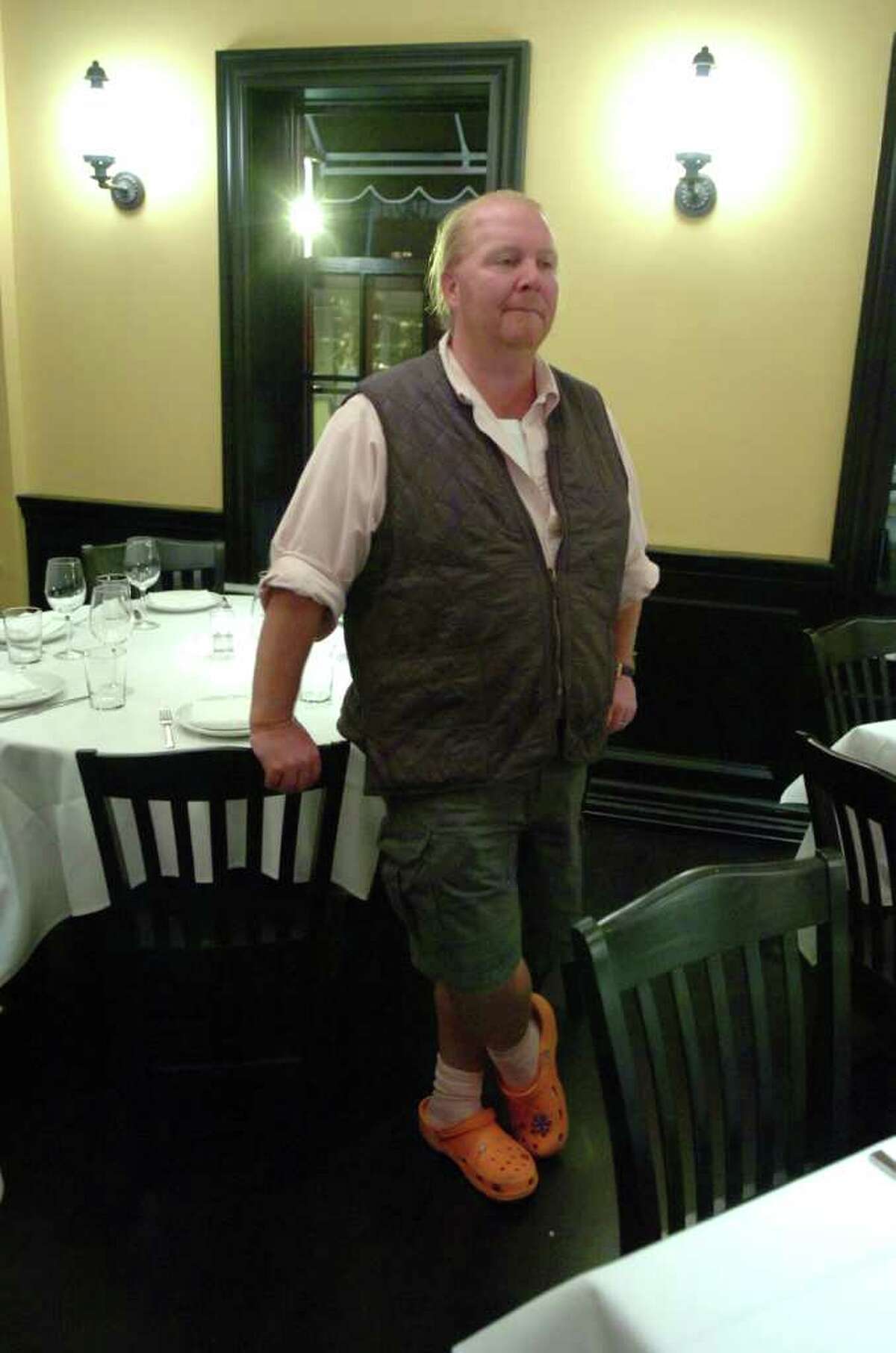 FILE — Celebrity chef Mario Batali wears his trademark clogs as he poses in his restaurant Tarry Lodge in Port Chester, N.Y.