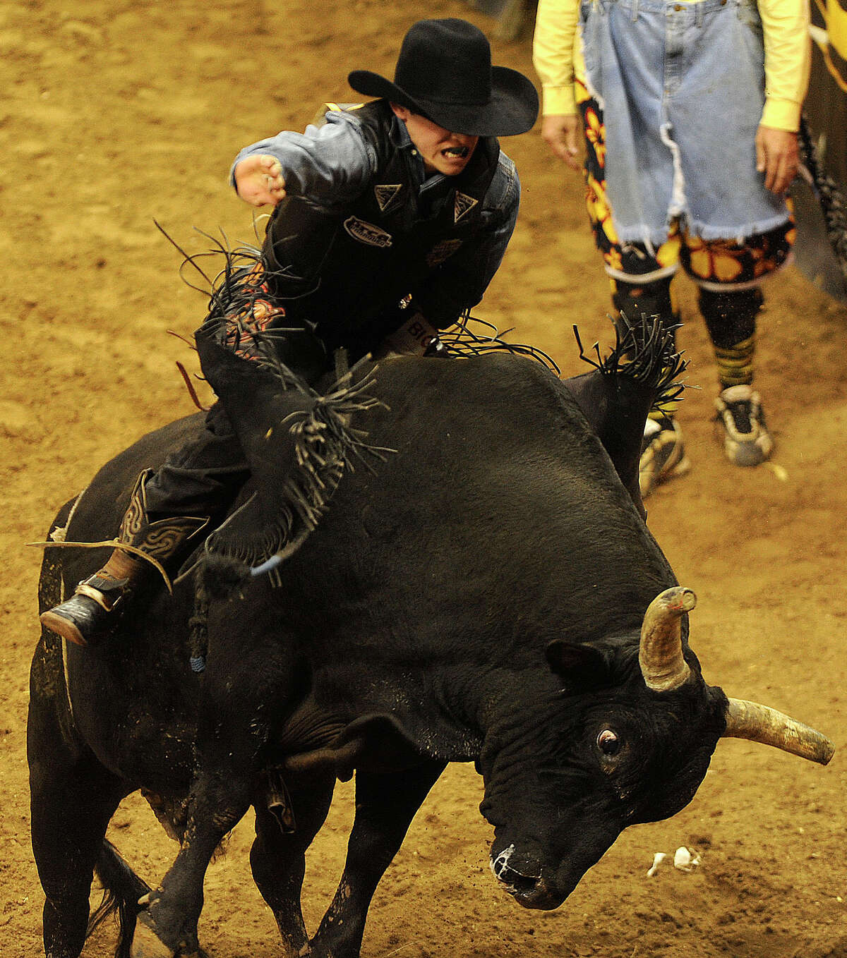 Jacob O'Mara from Prairieville, La., wins the bull riding competition by being the only cowboy stay on his bull for eight seconds during the matinee competition at the San Antonio Stock Show & Rodeo on Saturday, Feb. 12, 2011.