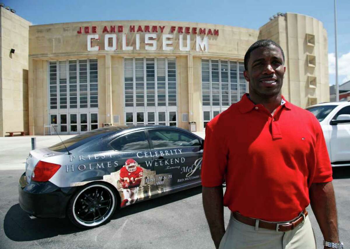 210SA; 210 PRIEST HOLMES JMS; 06/02/08; Retired NFL running back Priest Holmes stands outside Freeman Colliseum with a Scion car that will be given away as part of his Celebrity Charity weekend, coming up later in the month, Monday, June 2, 2008. ( Photo by J. Michael Short / SPECIAL )
