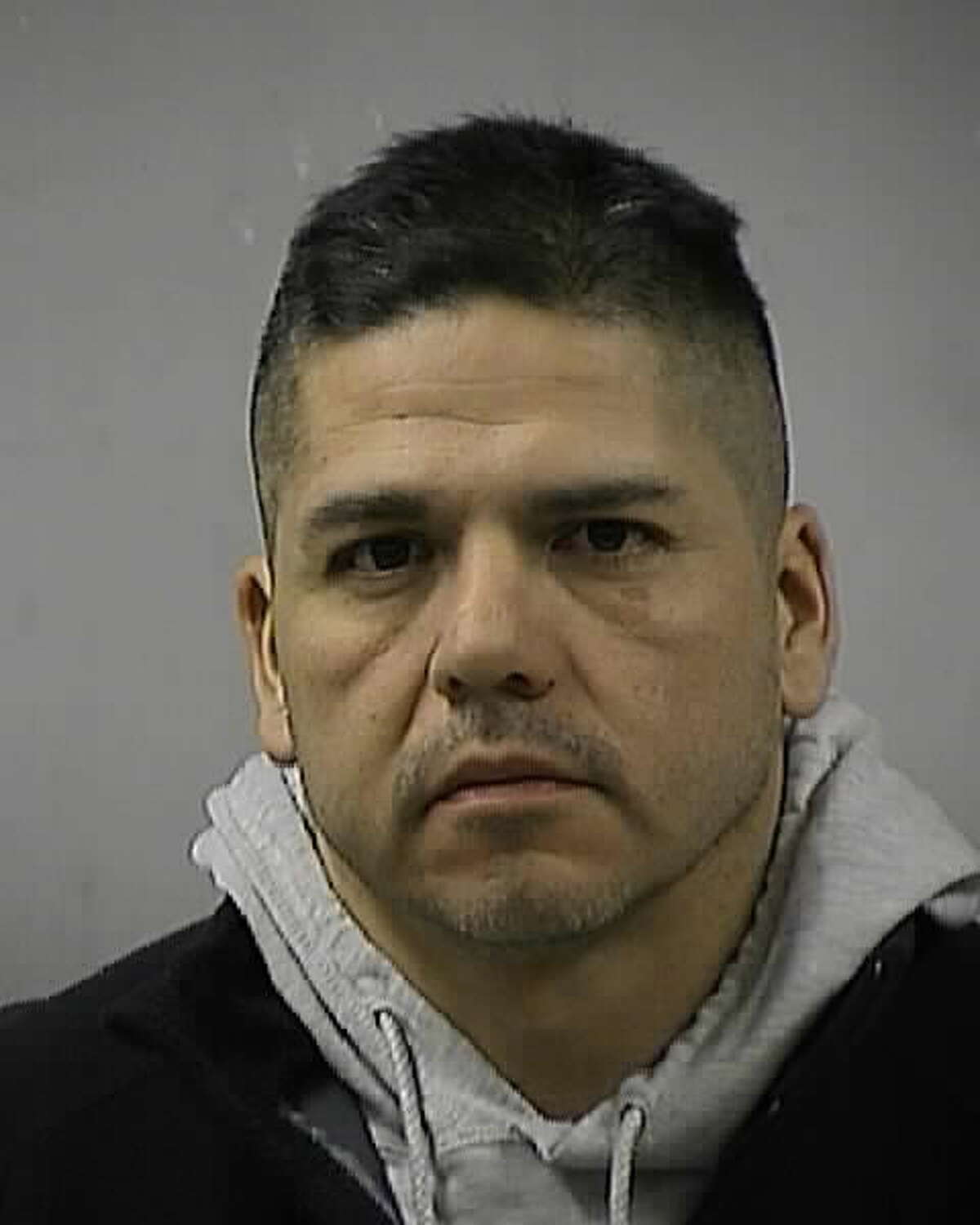 San Antonio police officer Roland Alvarado, 43, is accused of driving while intoxicated early Friday, when he crashed into a parked vehicle on the Northeast Side.