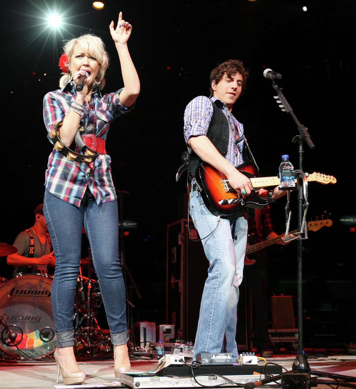 Steel Magnolia's Meghan Linsey (left) and Joshua Scott Jones perform Sunday Feb. 13, 2011 during the San Antonio Stock Show & Rodeo at the AT&T Center.
