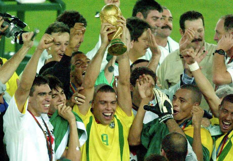 Image result for brazil ronaldo world cup trophy