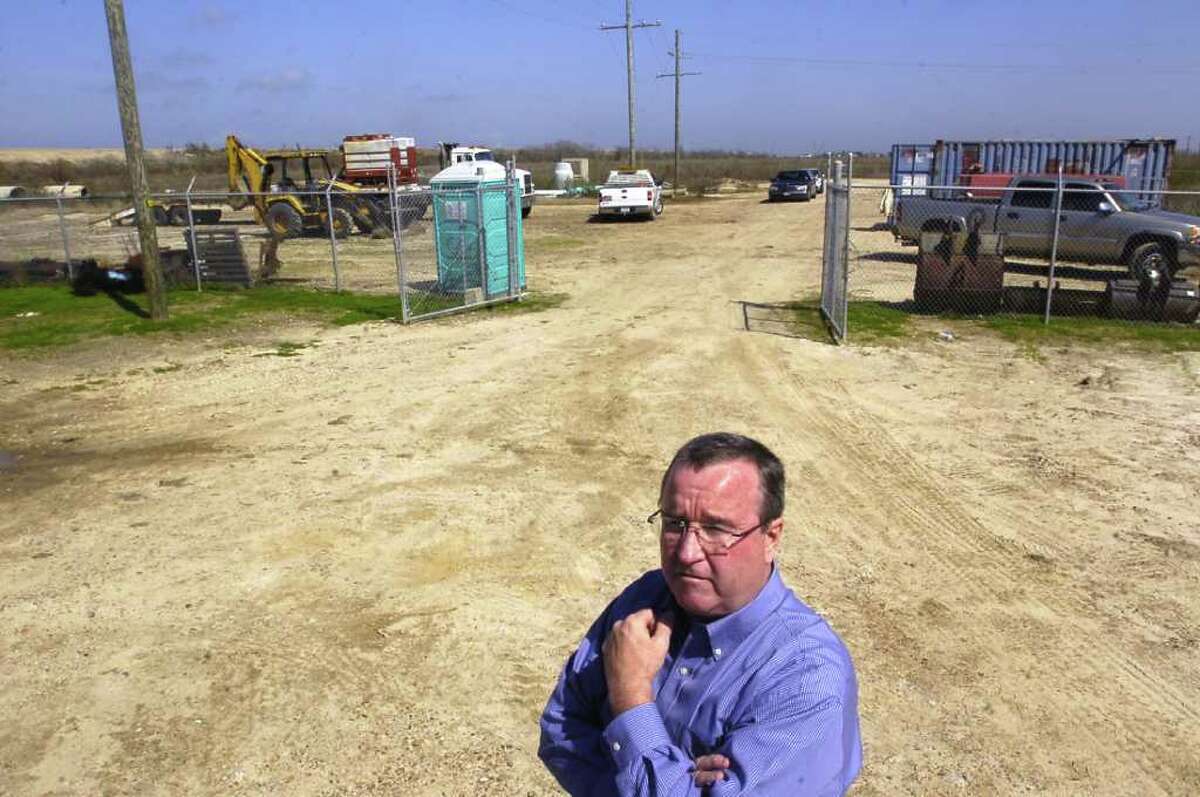 Scott Jarnagin, walks in an area near a current waste water treatment facility on the Bolivar peninsula where his company will build a sustainable waste disposal and power generation facility that will gasify 85 tons of waste and produce enough electrical power for the whole area. Sustainable Energy Properties Inc., a Houston based company, has low-carbon projects slated for Southeast Texas, including Bolivar and Beaumont developments. Part of the Bolivar project also includes and new beach front homes made of recycled products, five minutes from the Bolivar ferry. SEP's mission is to create a low-carbon models for future development that will produce jobs. Dave Ryan/The Enterprise