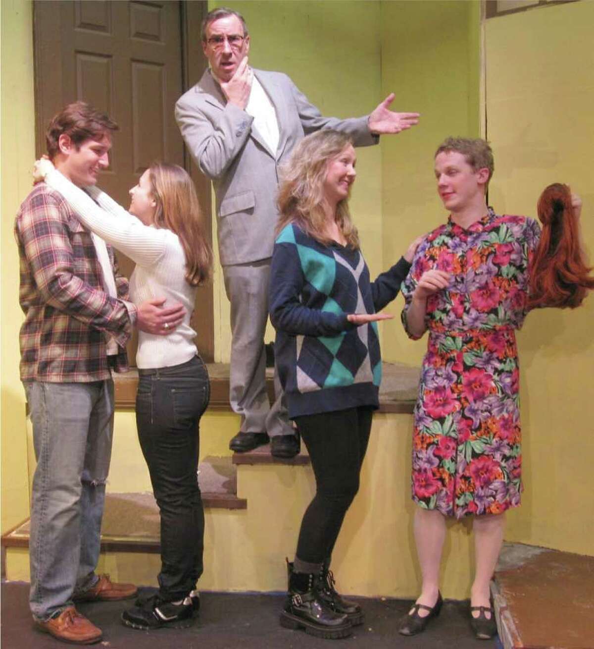 Internal Revenue Service agent Floyd Spinner, played by Bob Filipowich, presides over the happily reunited couples Jon and Kate, played by Townsend Ambrecht and Marta Coppola, and Connie and Leslie, played by Rochelle Woodson and Ryan Hendrickson. For more of the story, see the Town Players of New Canaan’s production of Billy VanZandt and Jane Milmore's comedy 'Love, Sex and the I.R.S.,' playing Feb. 25 to March 12 at the Powerhouse Theatre in Waveny Park, New Canaan. To reserve seats, call 203-966-7371. Contributed photo/Cindy Ording