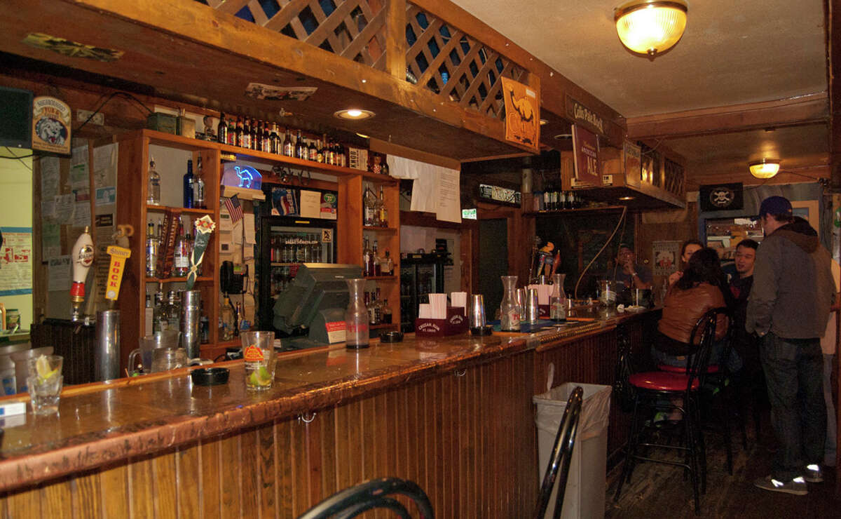 Oak Hills Tavern offers a cozy environment of pool and music in San Antonio. It's got all the trappings of your classic neighborhood watering hole.